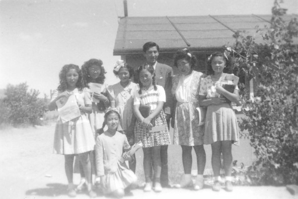 Japanese Americans attending a Sunday school class at the Poston War Relocation Center on the Colorado River in Arizona, about 1944. The author is not among those pictured. Courtesy of the Wada and Homma Family Collection/Densho Digital Repository.